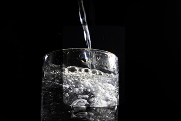 Water being poured into glass
