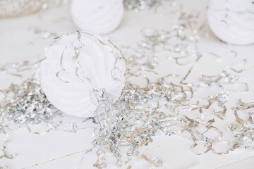 Winter decorations with silver accents and festive ornaments for Christmas