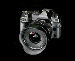 A State of the Art Mirrorless Camera on a Black Background