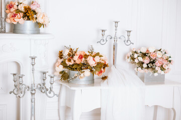 Beautiful Christmas decorations with flowers and candles for winter celebrations