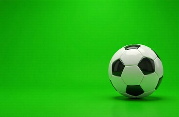 soccer ball on green background
