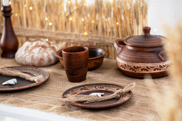 Celebration of winter holiday traditions with handcrafted decor and dinnerware
