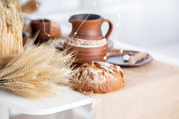 Cozy winter table setting with festive decorations for Christmas celebration