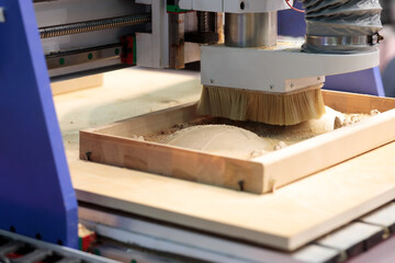 close up of CNC router machine carving wood