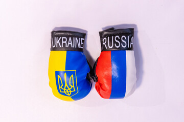 The Fight Between Russian And Ukraine Signified By Boxing Gloves