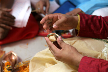 kanyadaan kanya daan by father in law or sasurji in traditional Indian Bengali Hindu Wedding. Pooja, Rituals, Customs and Traditions
