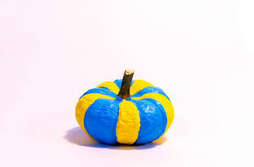 A Pumpkin Decorated In Colours Of The Ukrainian Flag