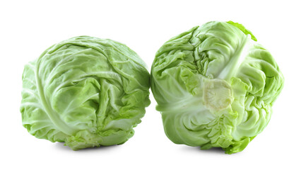 Obraz premium Two whole heads of cabbage isolated on white