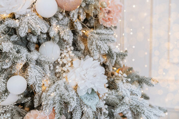 Christmas tree adorned with ornaments and lights celebrating the holiday season
