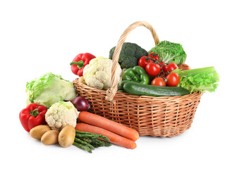 Different ripe vegetables in basket isolated on white