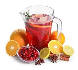 Aromatic punch drink in glass jug and ingredients on white background
