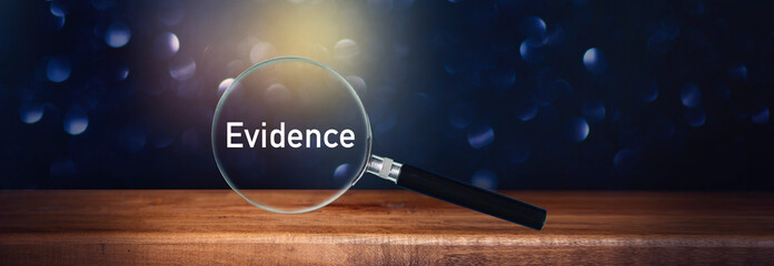 magnifying glass with evidence text