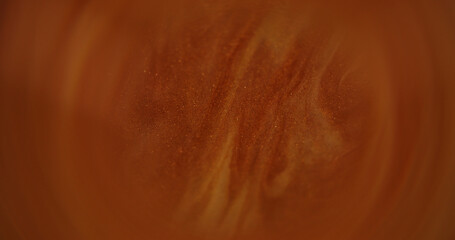 Ink water. Blurred glitter dust. Red brown color sparkling particles texture smoke shimmer splash...