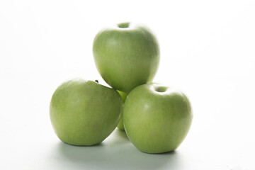 Granny Smith's green apples on a white background.