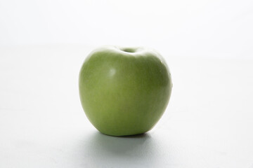 Granny Smith's green apples on a white background.