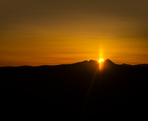 sunrise at the top of mountain