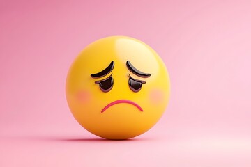 Fototapeta premium A crying emoji with a sad expression on a soft pink background