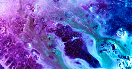 Shiny fluid. Color spill. Blue violet double flow glitter surface marbling effect. Bright purple...