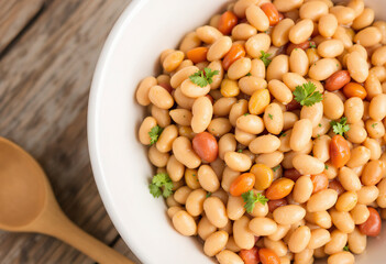 a white bowl filled with creamy baked beans