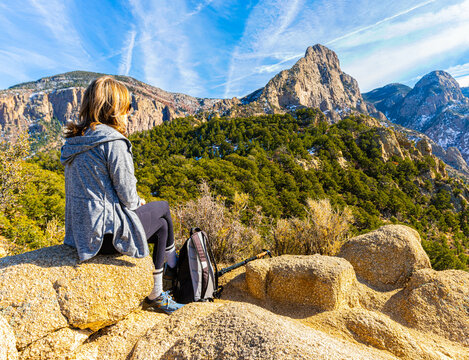 Female Hiker on Rocky Outcrop on El Rincon, Piedra Lisa South Trail , Sandia Wilderness Near Albuquerque, New Mexico, USA
