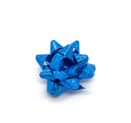 A shiny blue bow isolated on a white background.