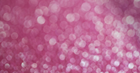 Defocused sequins. Delicate glitter. Soft flare decorative gleam of light pink colors. Happy daylight pastel hue glowing festive background.