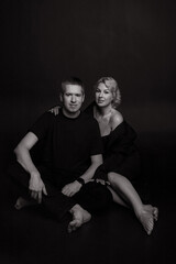 Elegant Black and White Portrait of Couple Captured in Beautiful Studio Setting