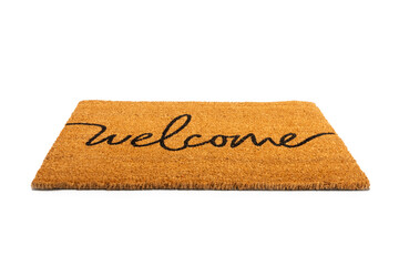 Door mat. Welcome mat isolated on white background. Women's shoes on a doormat on a white background. Interior decor element in the hallway. Close-up.