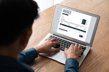 Invoice on computer screen from accounting application. Computer program for financial and budget of corporate business. Snugly.