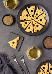 Food photography of homemade cheese biscuits with cider, caraway seed, herbs, savoury cookies, bakery, baking, pastry, carbonated drink