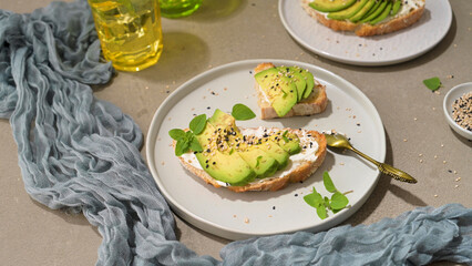 Toast with avocado cream cheese and wheat bread