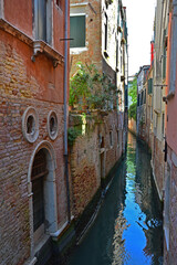 Narrow canal in the old part of Venice
