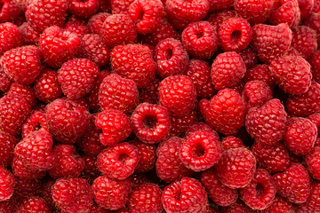 Tasty fresh raspberry as a background.