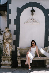 Stylish and Elegant Woman Posing Gracefully in a Beautiful Vintage Decor Setting