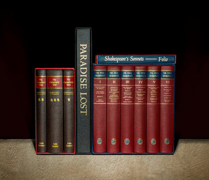 Hickory, NC, USA-8 Dec 2024: Folio Society Books collection, includes The Canterbury Tales, Paradise Lost, Shakespeare's Plays and Sonnets.  Dark, contrasting background.