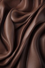 Obraz premium Luxurious Brown Silk Fabric with Smooth Folds and Soft Texture in Abstract Design