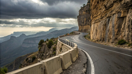 Winding Mountain Road with Dramatic Cloudscape