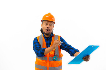 Indonesian male construction worker using safety gear excited posing using clipboard, construction and industry concept, isolated on white background.