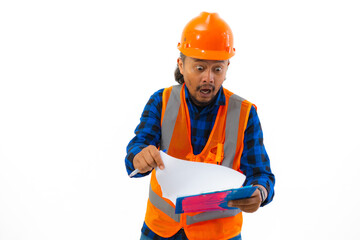 Indonesian male construction worker using safety gear excited posing using clipboard, construction and industry concept, isolated on white background.