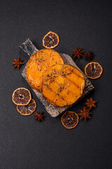 Pumpkin cut into slices and grilled with rosemary and spices