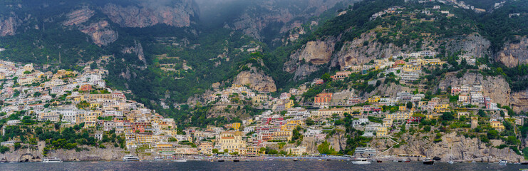 Naklejka premium A view from the sea of ​​a small, colorful town