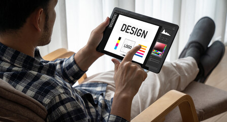 Graphic designer software for modern design of web page and commercial ads showing on the computer screen