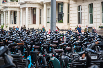 Lines of bicycles for hire in central London.