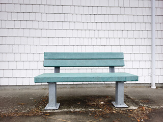 Bench against white wall