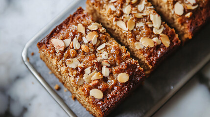 Plum cake with honey and almond topping.