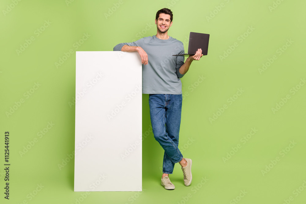 Poster full size photo of cheerful expression businessman lean on smartphone promotion isolated on green co