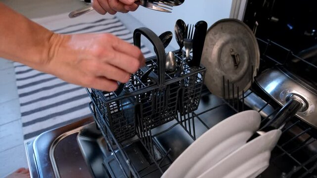 Video shows efficient dishwasher loading, optimizing space and ease