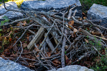 Campfire ready to burn a pile of wood logs.