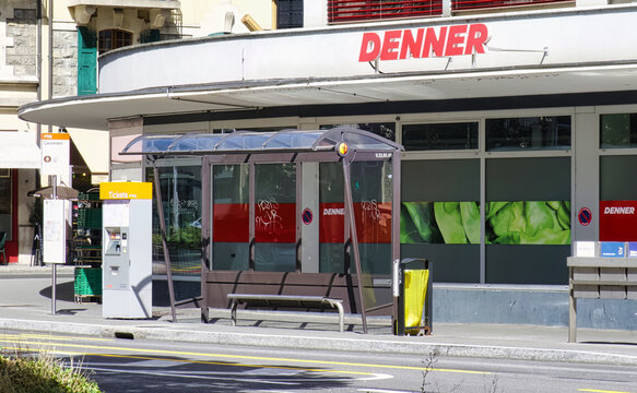 geneva, switzerland - 08 September 2022: the sign with logo of the swiss discount supermarket denner above the entrance of a city location