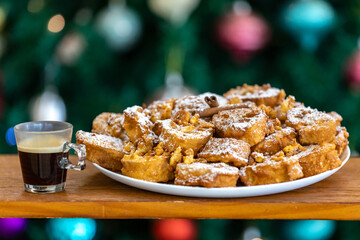 Authentic sweet Christmas French toast served with sugar and cinnamon in a Christmas atmosphere
